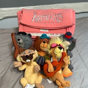 Aristocrats beanie baby’s with piano storage